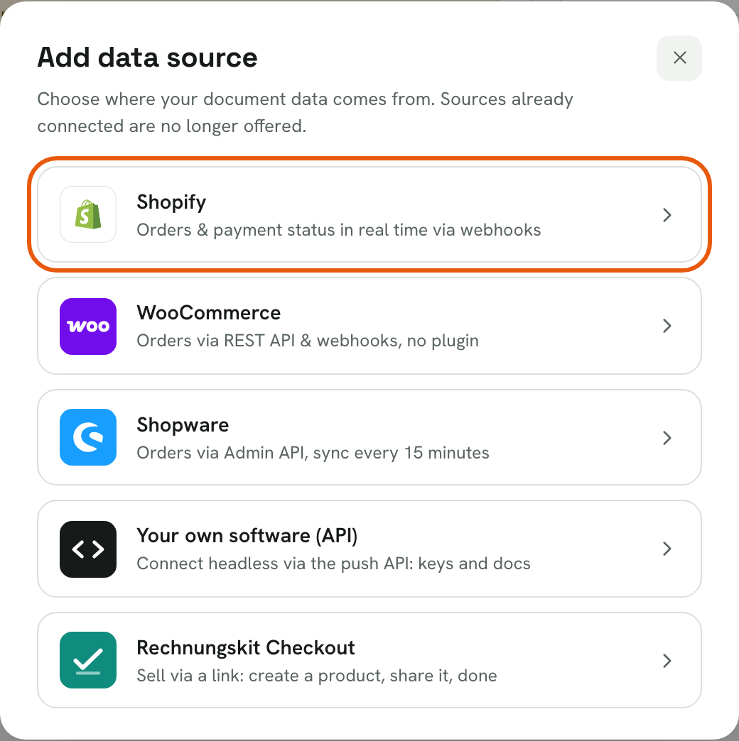 Rechnungskit, dialog "Add data source": Shopify is highlighted as the first option, below it WooCommerce, Shopware, Your own software (API) and Rechnungskit Checkout