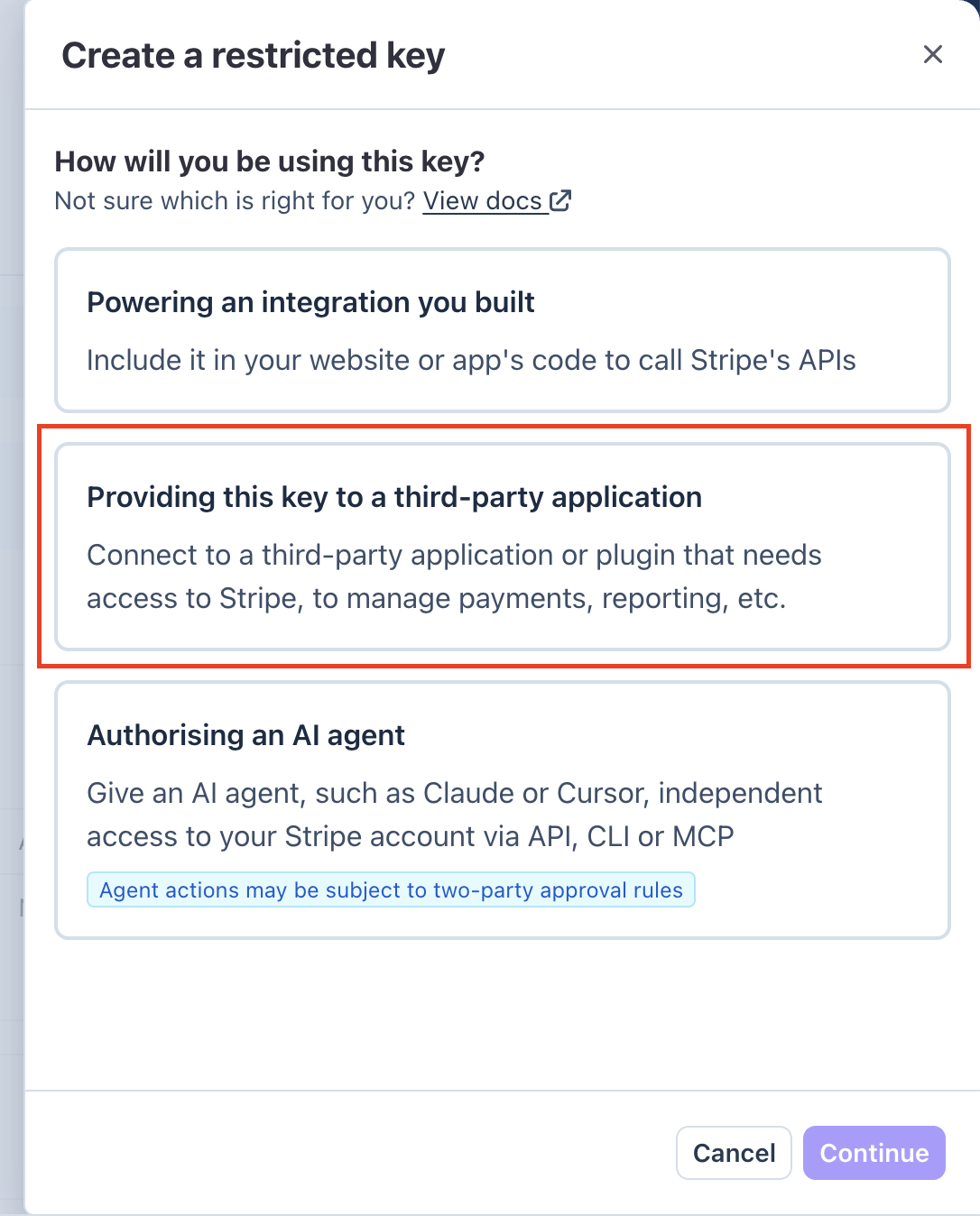 Stripe dialog "Create a restricted key" with the question "How will you be using this key?": three options, with "Providing this key to a third-party application" marked in red, "Powering an integration you built" above it and "Authorising an AI agent" below
